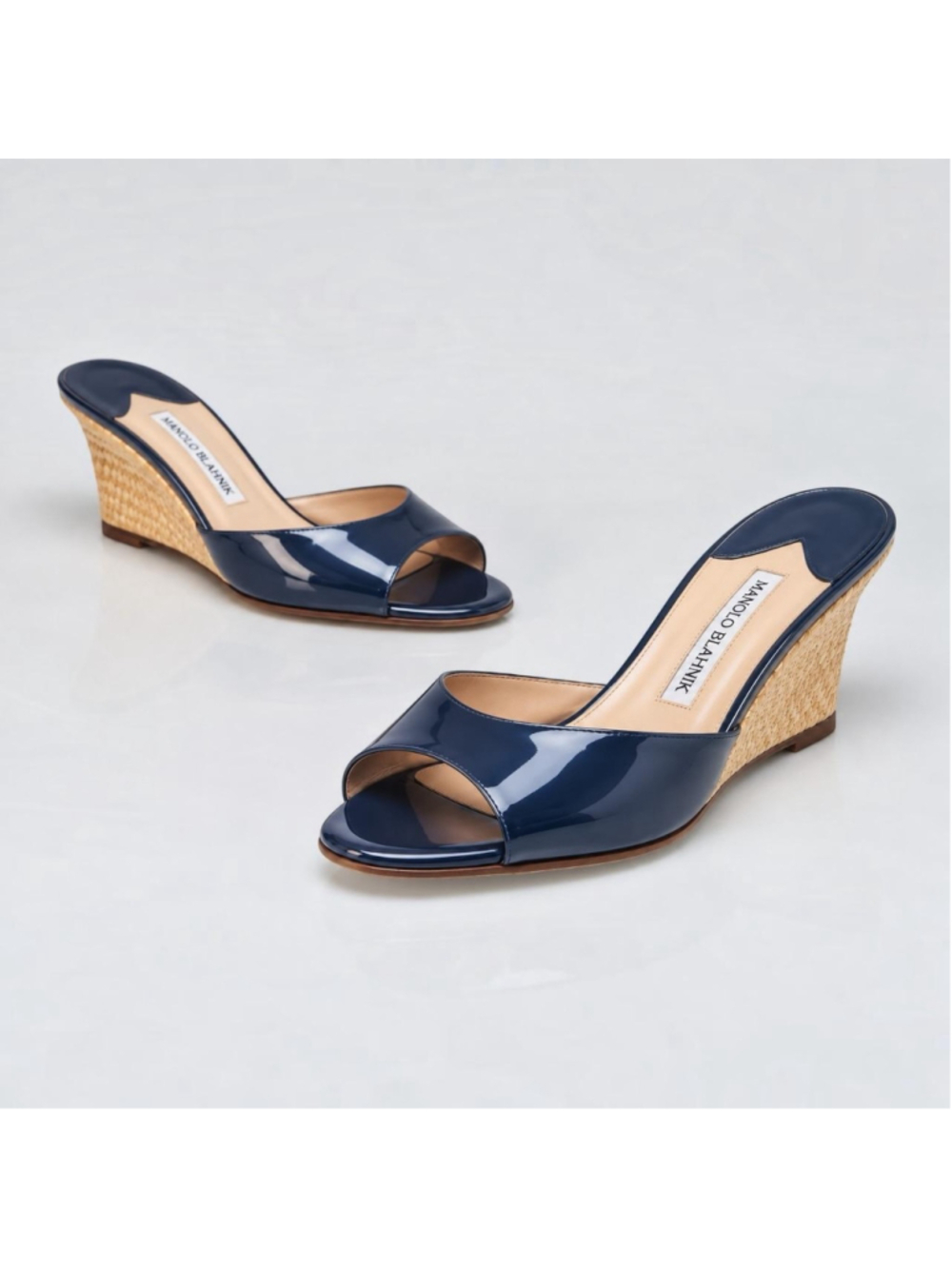 Manolo Blahnik Navy Patent Woven Wedge Mules EU 36

Manolo Blahnik navy patent l